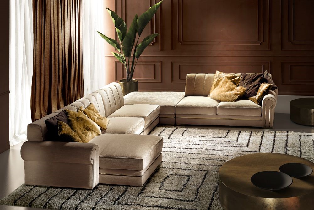 Quincy Evo divano angolare con pouf e chaise longue, rivestito in pelle o tessuto, è perfetto per il soggiorno in stile contemporaneo. Arredamento per la casa made in italy by formerin italia